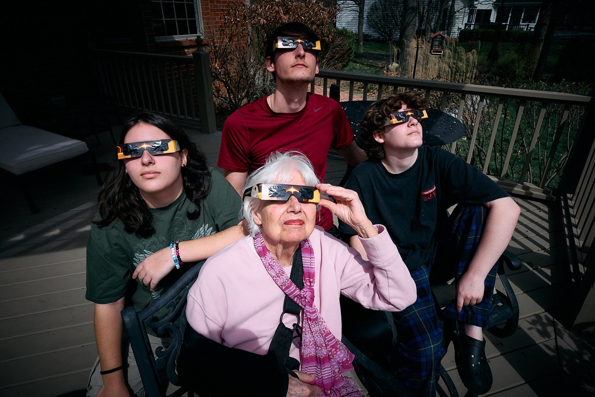 Group of people on a deck viewing the 2024 total eclipse of the sun in Columbus OH